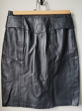 Load image into Gallery viewer, Front of 1980's style black pleather skirt
