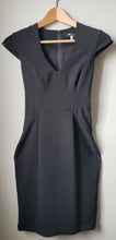 Load image into Gallery viewer, Front view of women's H&M black fitted dress with capped shoulders size 2.