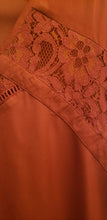 Load image into Gallery viewer, close view of Ricki's laced top, burnt orange colour, size large