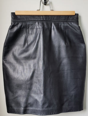 Front of women's black Danier leather skirt size 2 