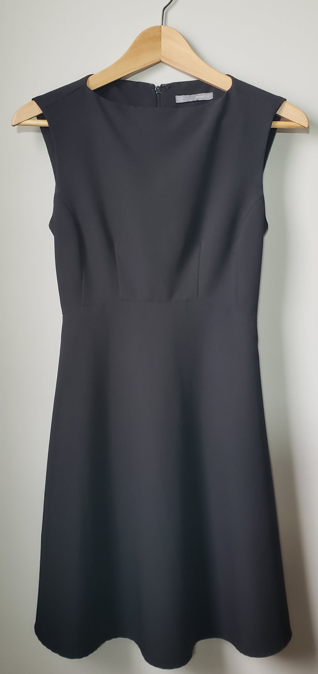 Front of women's Smart Set sleeveless and flared black dress size 00.