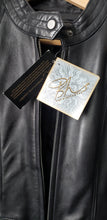 Load image into Gallery viewer, Close up of original tags of the black leather jacket size small
