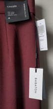 Load image into Gallery viewer, Close up view of Babaton Lincoln pants burgundy colour Long inseam, wide pant leg, size 4. Brand new with original tags.
