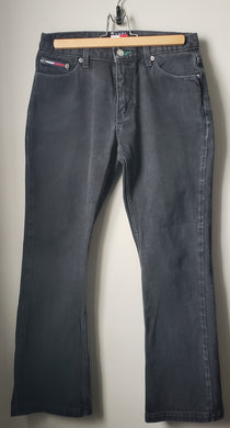 front view of vintage Tommy Hilfiger black denim jeans size 26